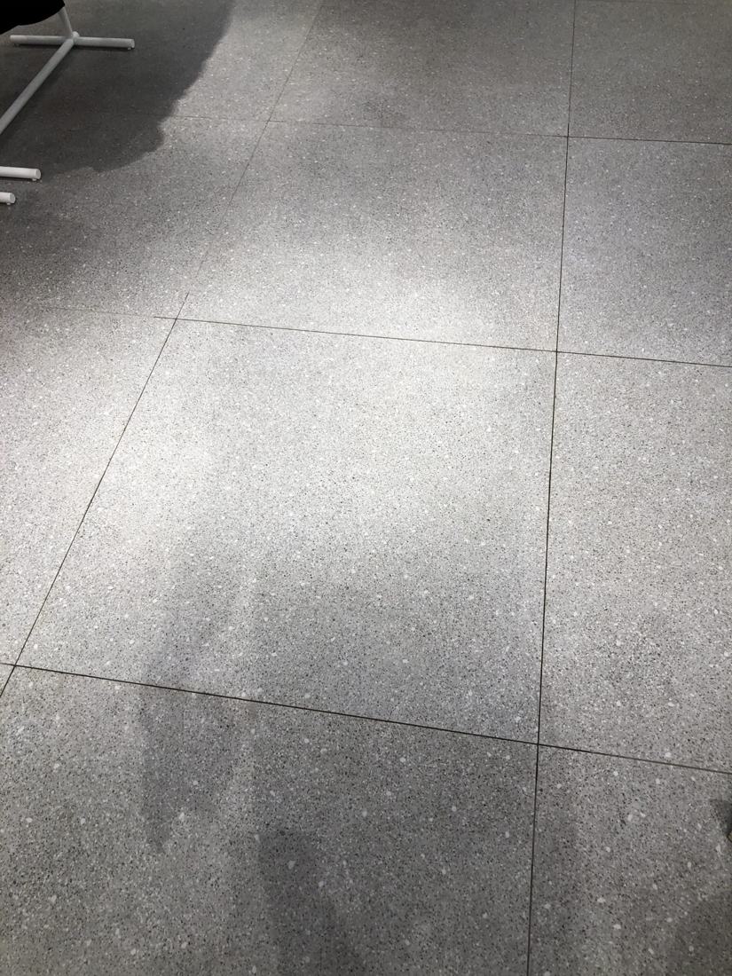 New large-format tile floor in a commercial space