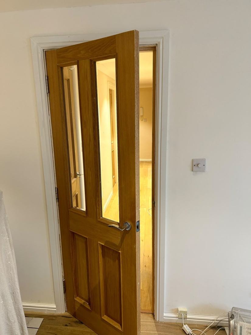 Finished interior with painted walls, door lining and skirting boards